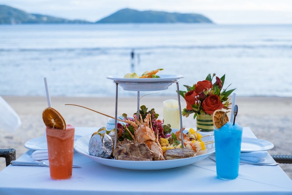 Beachfront table for two with a fresh seafood platter