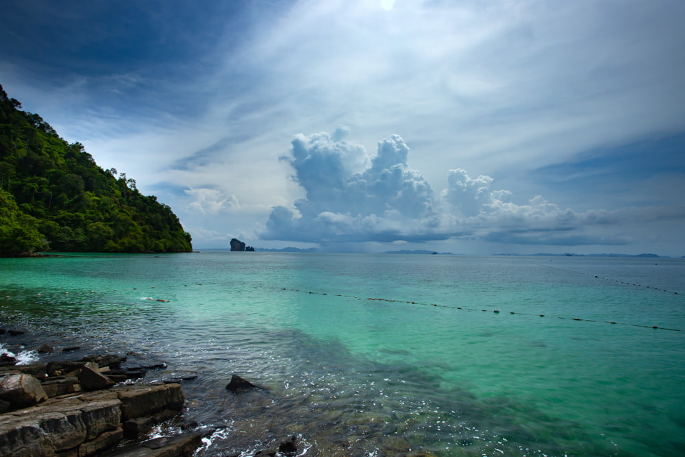 Stormy clouds over Phuket. The rainy season often means a change in plans for many people