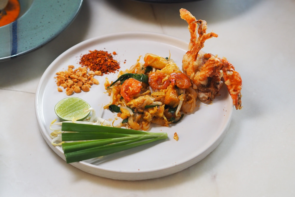Free-range chicken satay with peanut sauce at Ocean Rhyme, a mild Thai food option for picky eaters