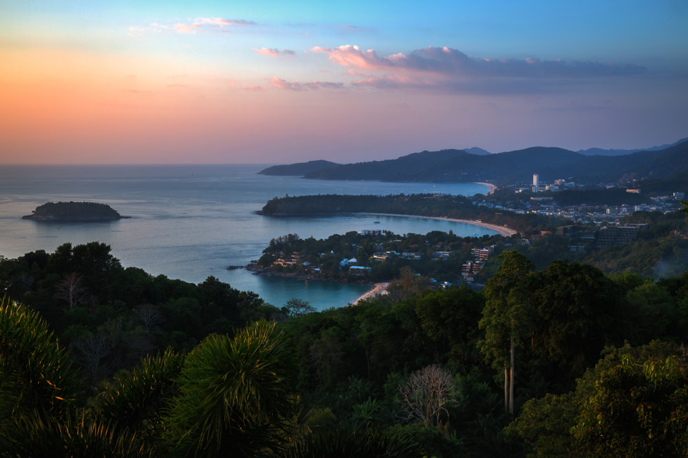 Sunset aerial view of three beaches from Karon beach viewpoint in Phuket
